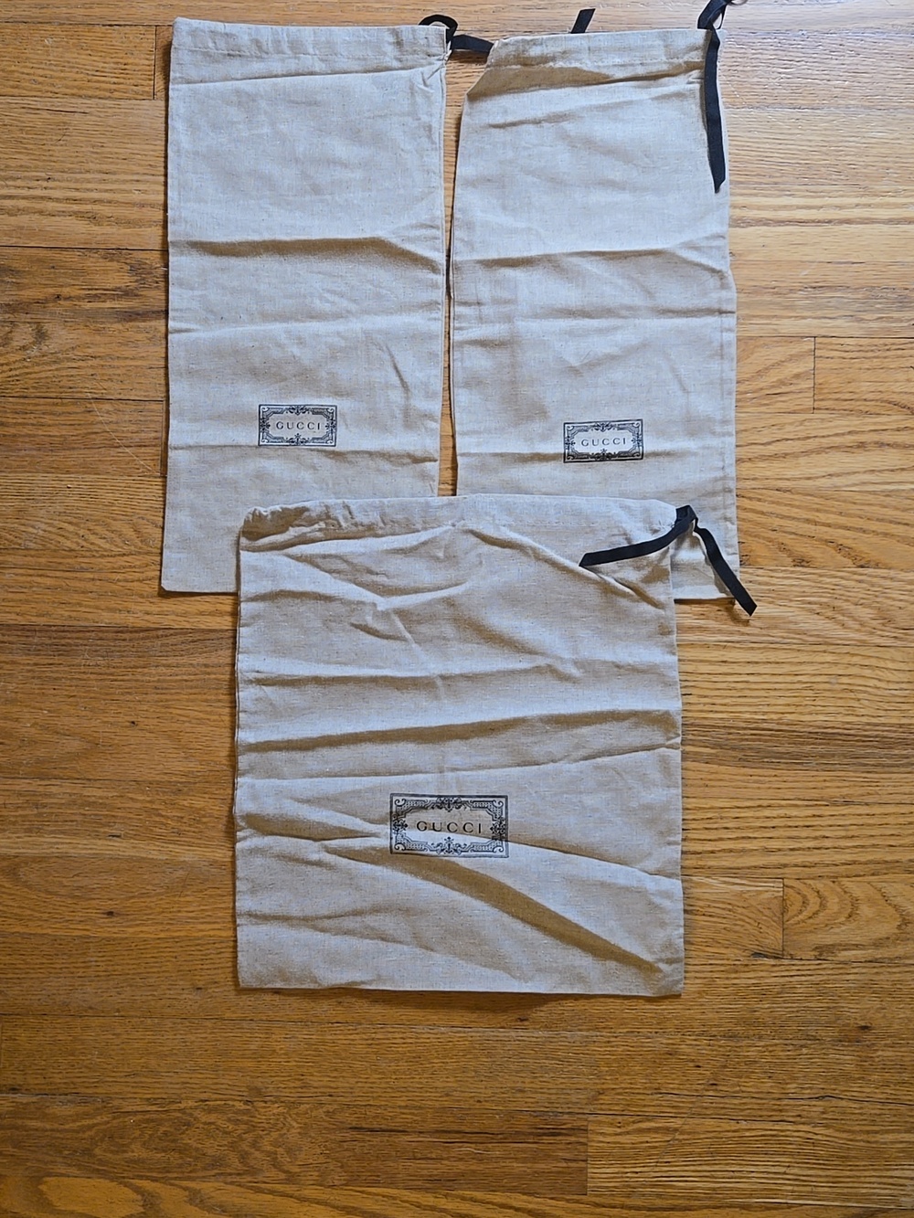 3 Gucci tan canvas logo drawstring closure dust bags